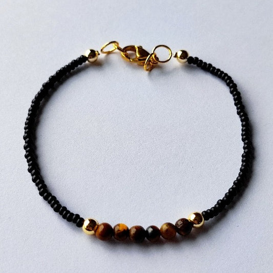 Bracelet en perles de pierres naturelles  "Oeil de Tigre"